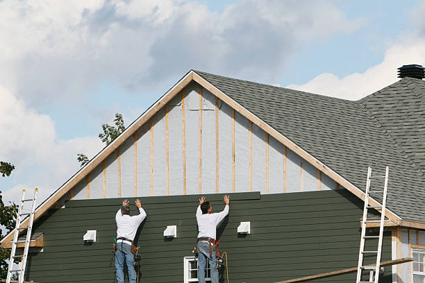 Professional Siding Replacement technician working in Candler, NC